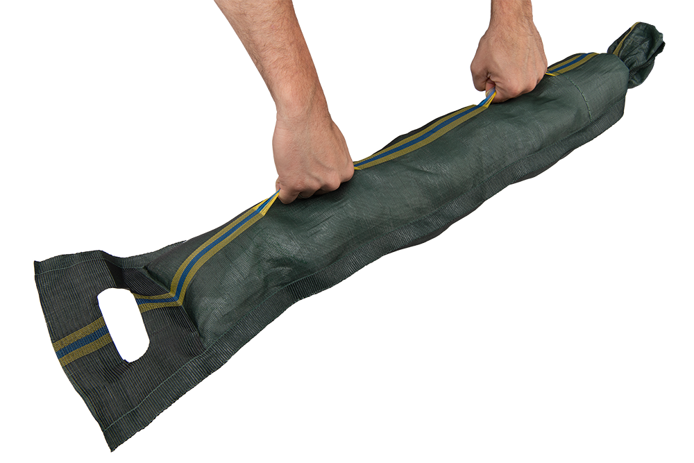 Bradas Groene Zandslurf in gebruik voor zandopvang en bescherming tegen weersomstandigheden.